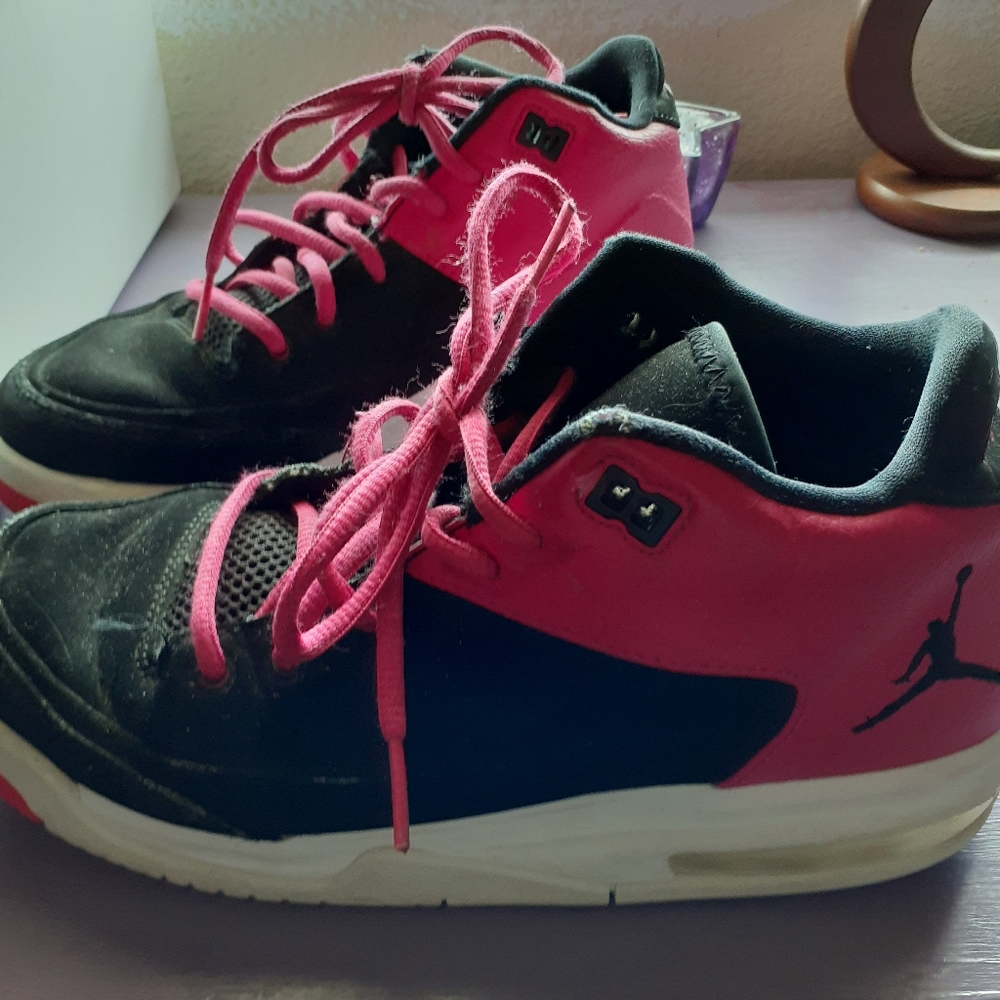 Size 6 youth pink and black Nike flights